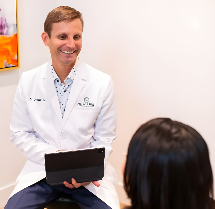 Dr. Daniel Lee consulting with a patient